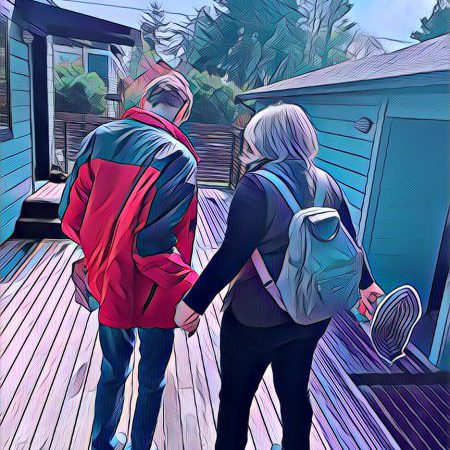 prisma filter JR and Joey hold hands red coat gray backpack